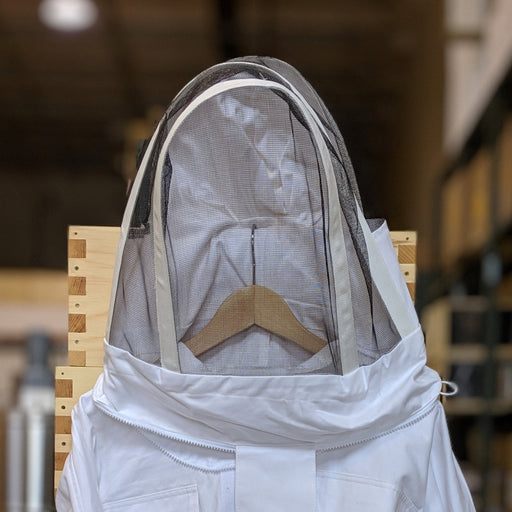 A white cotton beekeeping jacket with a fencing veil, elastic cuffs, thumb loops, and a logo on the chest.